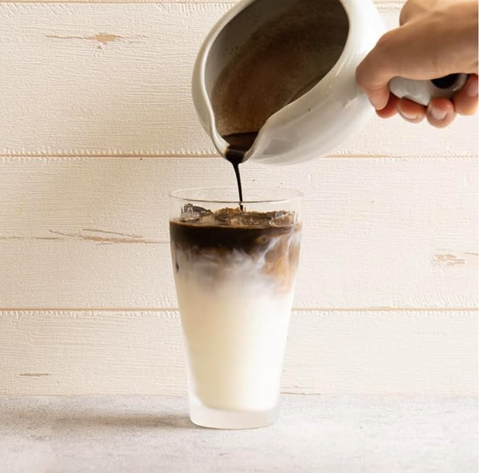 hojicha powder latte in a ceramic cup